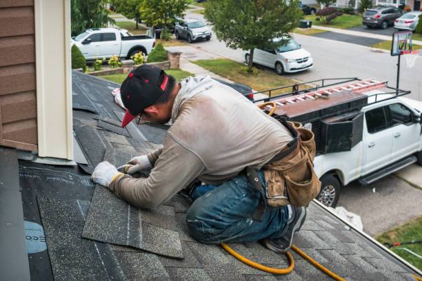 Professional Flat Roof Repair technician working in Danbury, TX